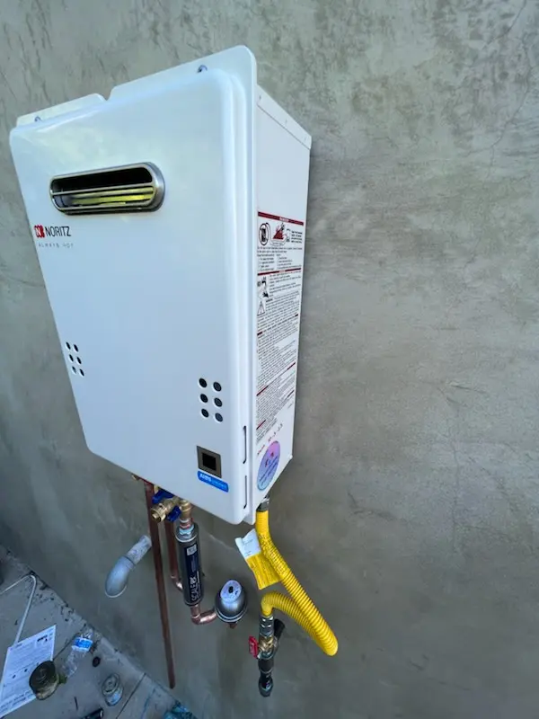 Tankless water heater installation for Perry homes